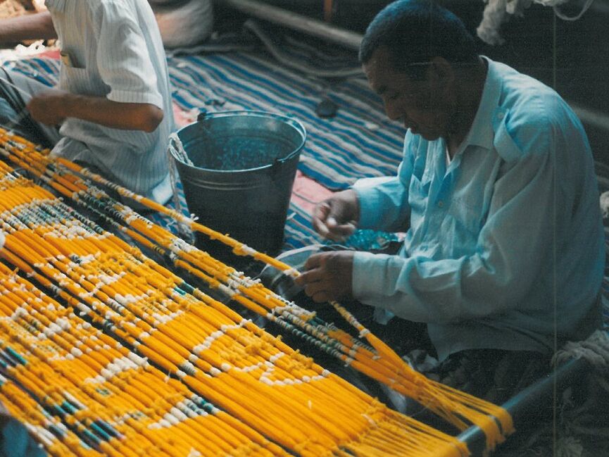 On the Silk Road, specifically in the Fergana Valley in eastern Uzbekistan, we visit a silk mill. This picture was taken in 1998.