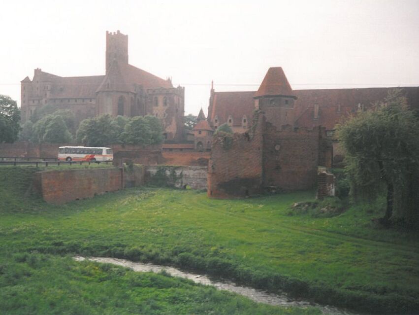 The Marienburg in Malbork is mostly photographed across the river. Here is the back - taken in the 1990s as you can easily see on the historic bus.