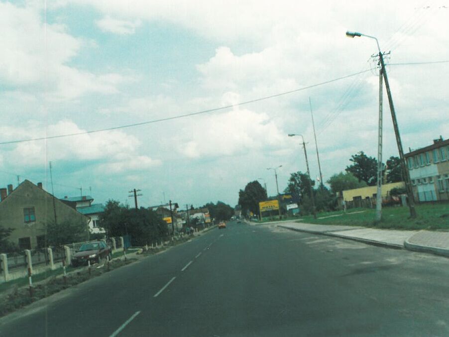 With the exception of the motorway from Katowice to Warsaw, Poland used to be just a country road. The picture was taken between Warsaw and Brest.